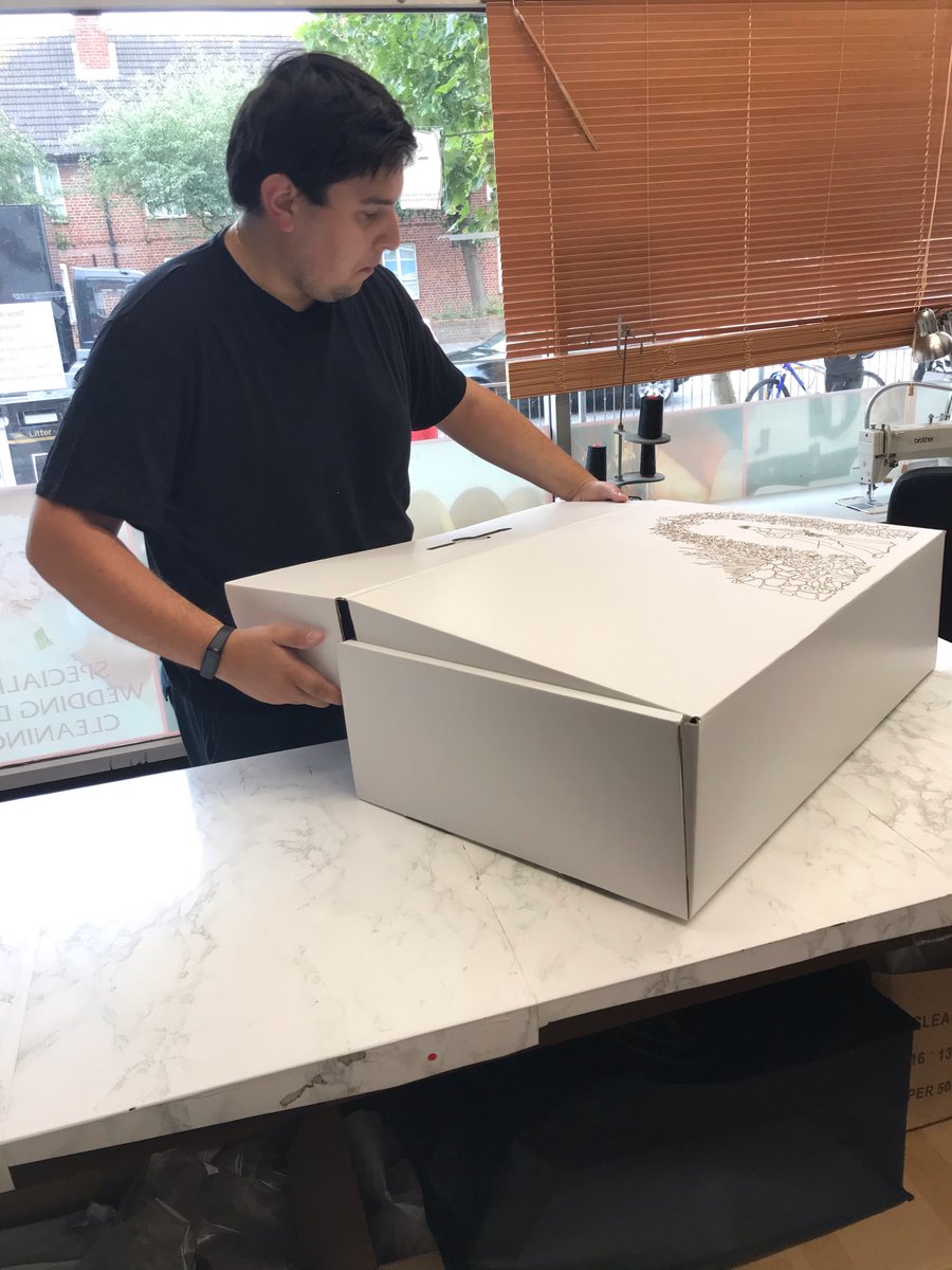 5ElmsDryCleaner's tweet photo. Boxing a wedding dress is like giving yourself the ultimate present.  Here's Jonathan boxing a wedding dress we cleaned recently. Isn't that box just beautiful!?

#qualitydrycleaning #professionaldrycleaning #dagenham #fiveelmsdrycleaners #weddingdresscleaning https://t.co/Yy5ngh4wlP
