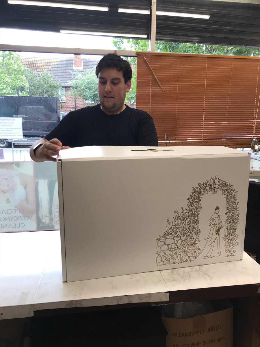 5ElmsDryCleaner's tweet photo. Boxing a wedding dress is like giving yourself the ultimate present.  Here's Jonathan boxing a wedding dress we cleaned recently. Isn't that box just beautiful!?

#qualitydrycleaning #professionaldrycleaning #dagenham #fiveelmsdrycleaners #weddingdresscleaning https://t.co/Yy5ngh4wlP