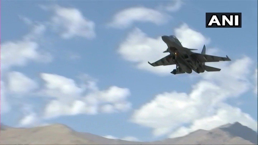 ANI's tweet photo. Indian Air Force (IAF) Su-30MKI and MiG-29 fighter aircraft carrying out air operations at a forward airbase near India-China border. https://t.co/dgknHJDw3s