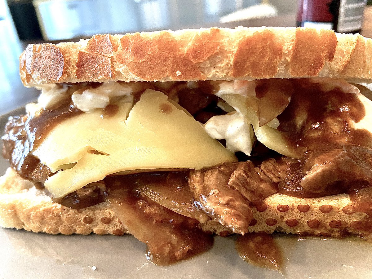 dav3boy's tweet photo. #ribeyebeef and #balsamiconiongravy, with apple wood smoked cheese and slaw.served on tiger bread with a splash of reggae sauce .  Kitchen closed. https://t.co/bzSFj5O9Cv