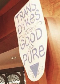 (remember the uproar over the 'trans dykes are good and pure' protester shields?)
