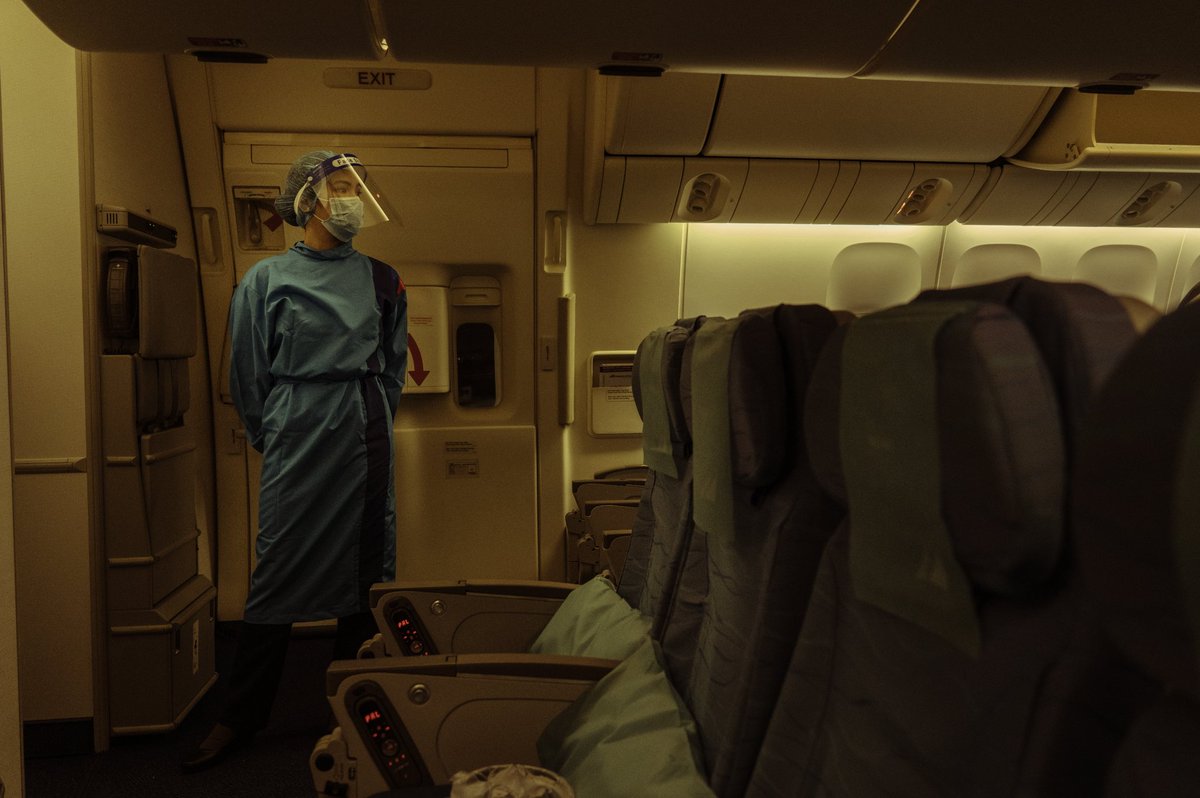 Inside our plane, flight attendants were in their PPE.