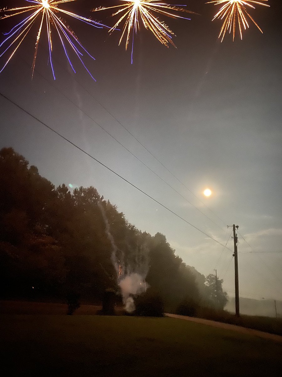 nc__johnson's tweet photo. Cool shot we got tonight with the moon behind it! @spann https://t.co/5FqPsxdn5t