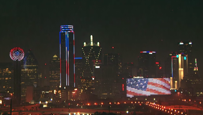 The Dallas skyline all dressed up for the 4th in its finest red, white and blue.
