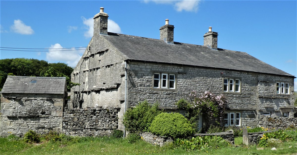 Projecting through-stones or slates are often seen on buildings in the Yorkshire Dales binding the inner and outer faces of the wall. But why do they project - to throw off the rain, to show where the through-stones exist, or simply to avoid the need to trim their length?