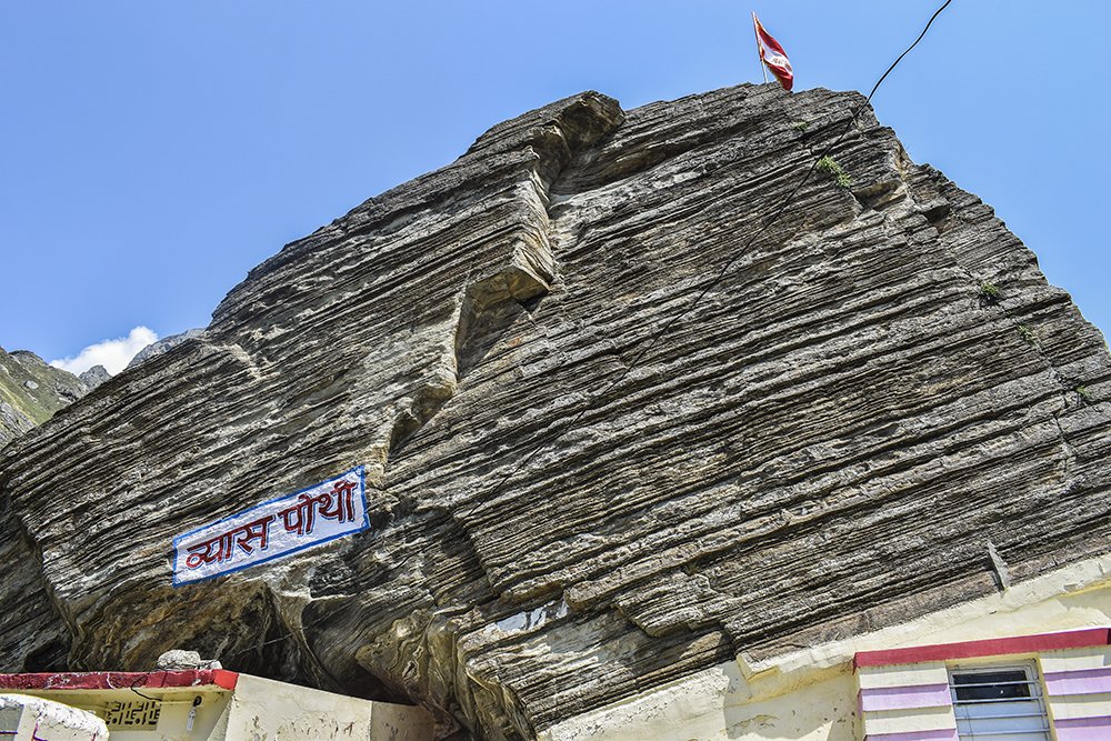 Vyas Gufa in Mana villageVed Vyas lived inside this cave while composing the vedas. In the cave their is a shrine dedicated to him, is believed to be more than 5000 yrs old.The huge rock over Gufa looks like a book and is being worshipped as a Vyas Pustak.  @LostTemple73/4
