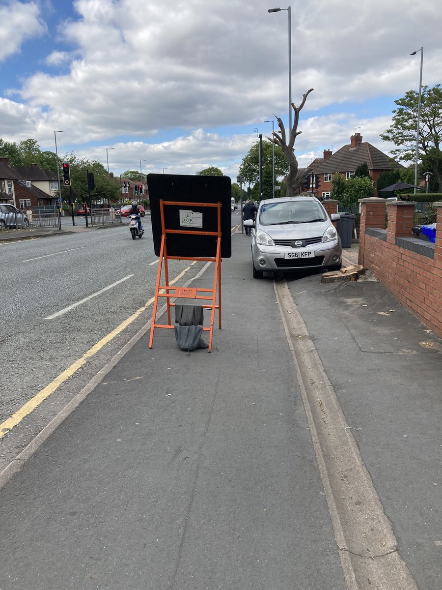 protectenhance's tweet photo. Another delight on princess road. Couldn’t cycle past this without a little snap! Cars AND signage on the shared cycle/footway! #princessroad need #cyclepriority https://t.co/oPkAsvEGWO