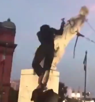 Complex's tweet photo. Baltimore protestors tear down Christopher Columbus statue and toss it in inner harbor during July 4th. 

More: https://t.co/n9KOMxadZa https://t.co/iaoQhhV6uq