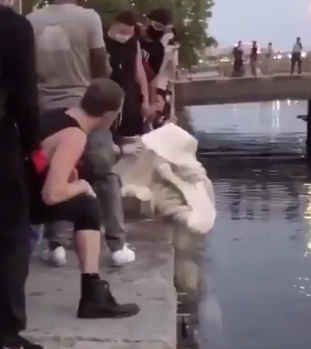 Complex's tweet photo. Baltimore protestors tear down Christopher Columbus statue and toss it in inner harbor during July 4th. 

More: https://t.co/n9KOMxadZa https://t.co/iaoQhhV6uq