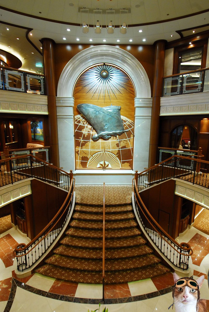 MurphyTCat's tweet photo. Dis da main atrium aboard #MSQueenVictoria, der no ships cate, but ai was gibbin a dish ov smoked salmon an a dish ov cream on arrival, it eerie but beeutifull aboard xx #TheAviators #CatsOfTwitter https://t.co/IiYexo81uF