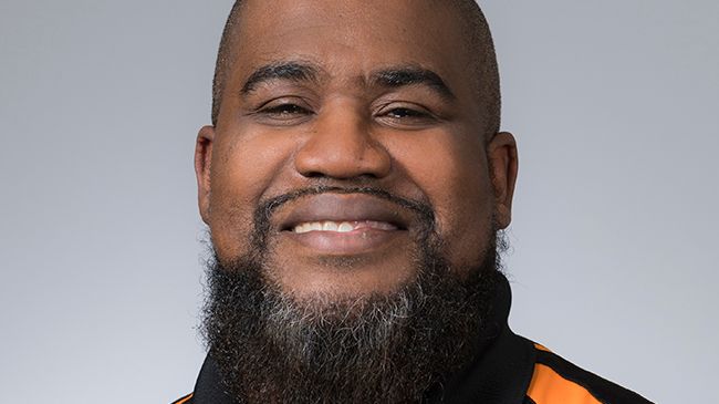 OSUMedicine's tweet photo. Meet this week's health care hero: Aaron Molett! As a maintenance technician supervisor at OSU-CHS and @osutulsa, Molett and his team delivered cleaning kits to departments and installed COVID-19 signage across campus and the OSU Medicine clinics. Thank you Aaron! 🧡 https://t.co/hXzJeiXl5Y
