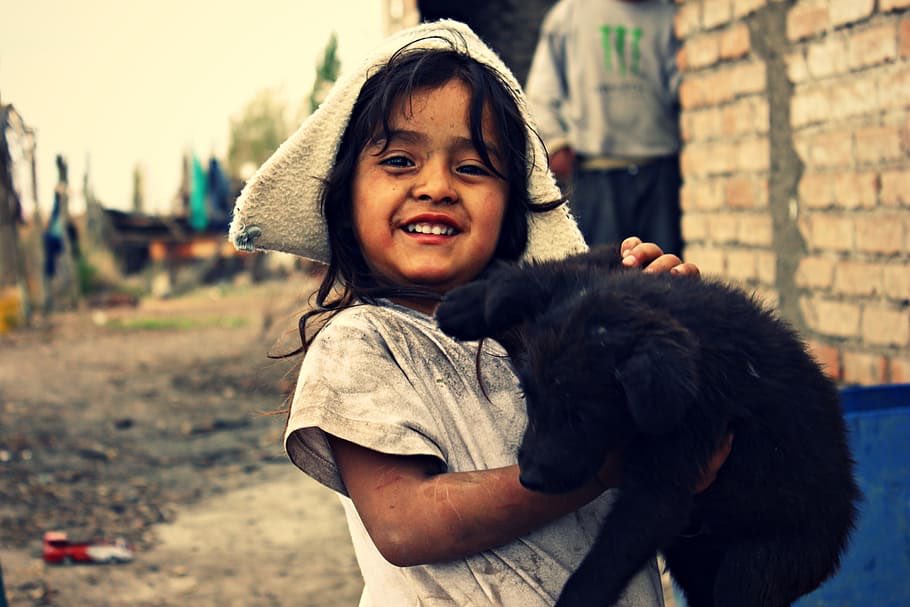 That’s when it hit me. I had on me just over 200.00 CAD which I had kept aside for any emergency. I kept thinking about his daughters. I asked to see more pictures of them and he had many. There was no toy in the pictures. But they looked so happy. So palpably content.