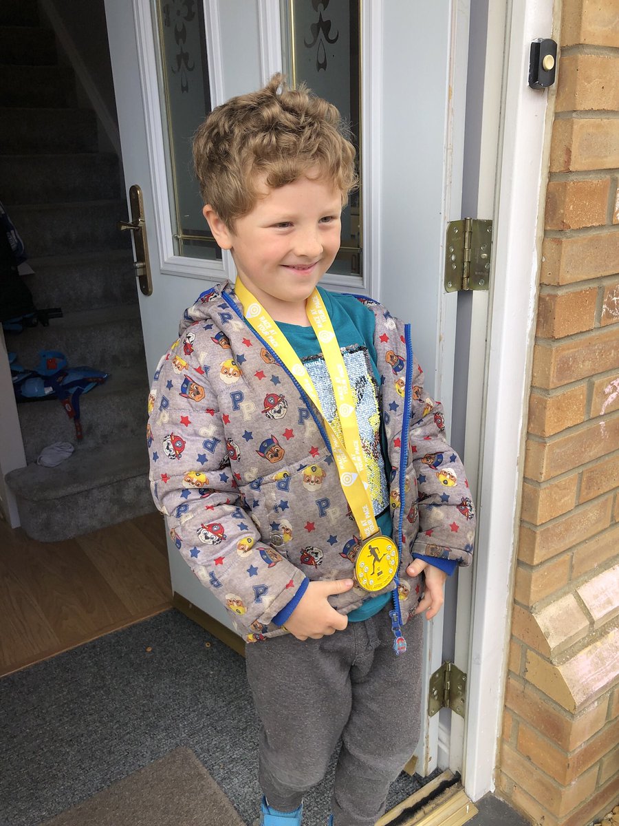 EmStebbing's tweet photo. @NVPSPuffins frankie had the target of running ten miles in a month. He did it and got a medal! https://t.co/zLmSU4hSdV