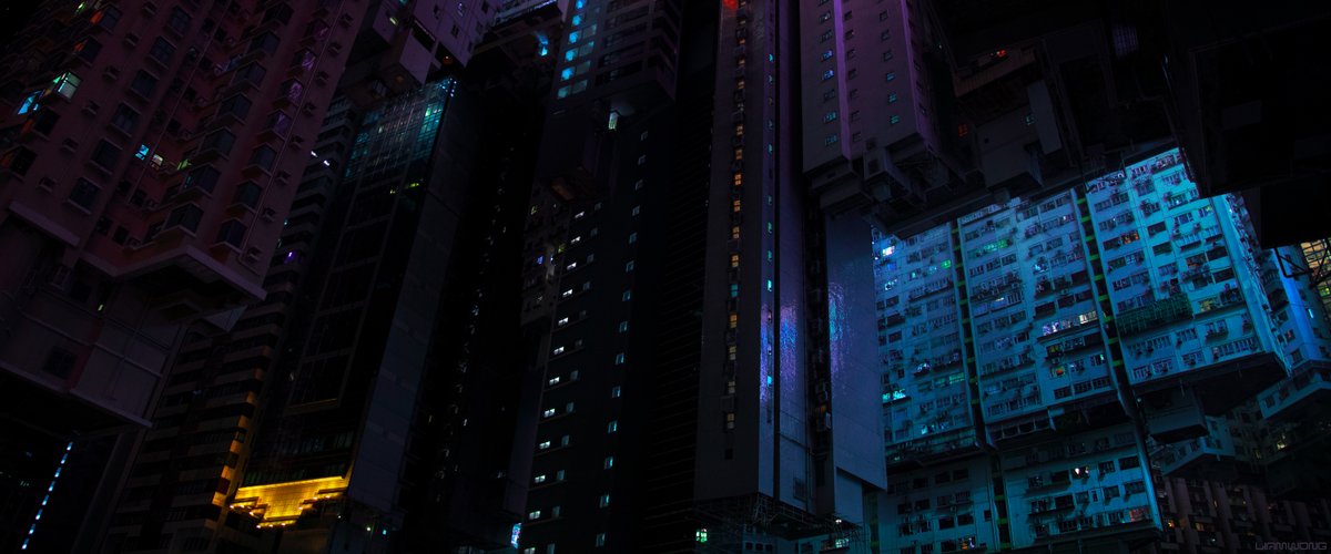 Photography by Liam Wong of Hong Kong at night. An upside down shot of a cityscape looking downwards/upwards. The scale of the buildings is huge. It is colored in a surreal way to make the viewer question if it is a 3D render or a photograph.