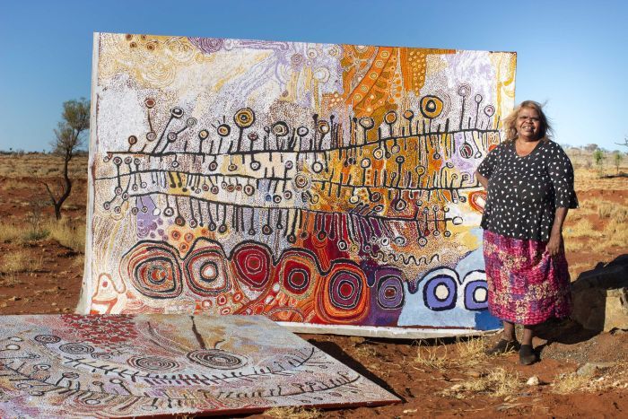 womensart1's tweet photo. When Nyunmiti Burtom &amp; other female Australian Aboriginal artists from a remote community heard of the Christchurch Mosque attack, 2019, they showed grief by creating a canvas for NZ Muslim community depicting people separated by sea, culture, but united in humanity.
 #womensart https://t.co/gUFnyWcKze
