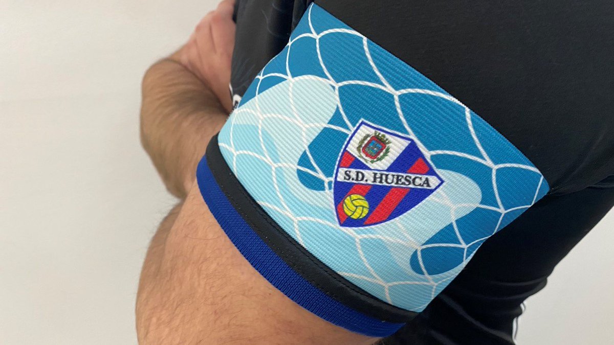 MÁLAGAMálaga are famous for their anchovies and so people from the city and it's team are nicknamed los 'boquerones'. Highlighted in this captain armband with the skin of anchovies