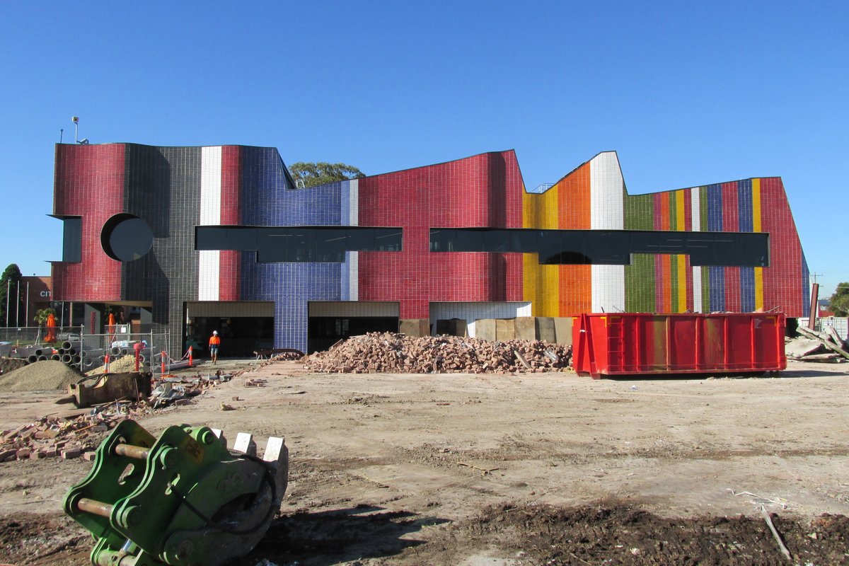 LyonsArch's tweet photo. #WIP | @greaterdandy's #SpringvaleCommunityHub is almost complete. Over coming months the Hub's outdoor landscaped #greenspaces (w/ #RushWrightAssociates), playgrounds and barbecue areas will be completed—more to come.

Pictured: a photo of the colourful western facade https://t.co/0o2WWiffx3