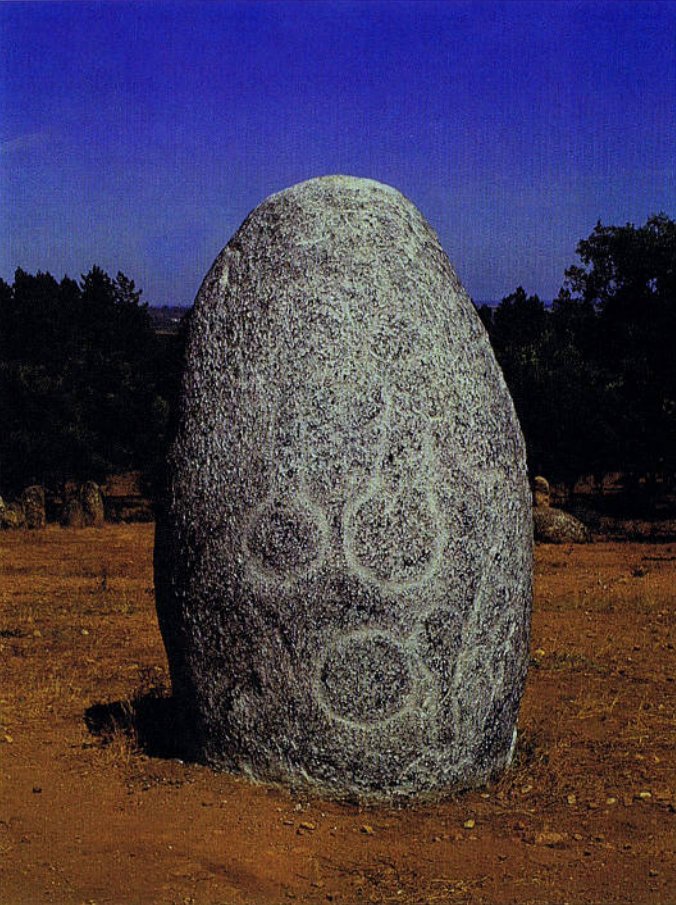 10/ Looking at the symbols on the menhirs, the most common are lunar crescents and phallic shapes. However, there is also what it seems to be a bird on the Almendres Menhir. Other stones in the cromlech also have tree like symbols, suns, an Irminsul-like engraving and spirals