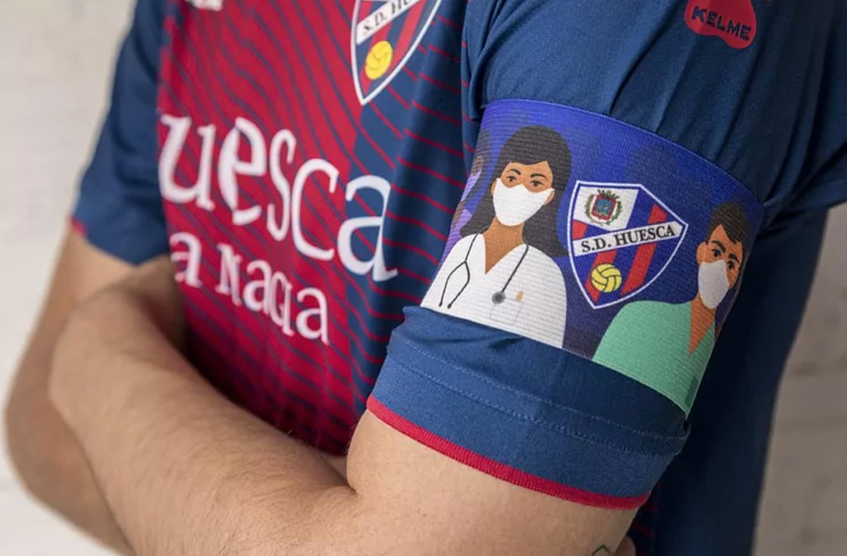 For their home matches Huesca normally use their normal captain armband but for the home match against Mirandés (the first after the break), they had a special one. Highlighting and paying tribute to the heroes in this covid-19 crisis