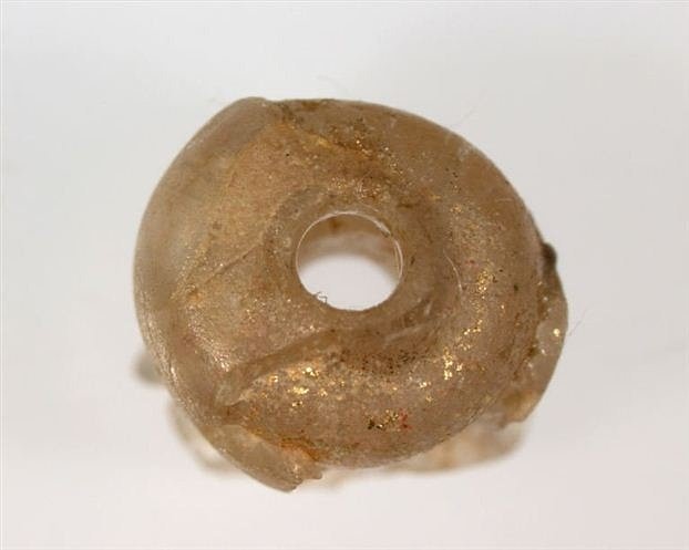 Some Roman glass even made its way as far east as Japan; for example, this Roman glass bead was found in the early 5th-century AD Utsukushi no.1 burial mound in Nagaoka-kyo, Japan:  http://www.thehistoryblog.com/archives/17691 