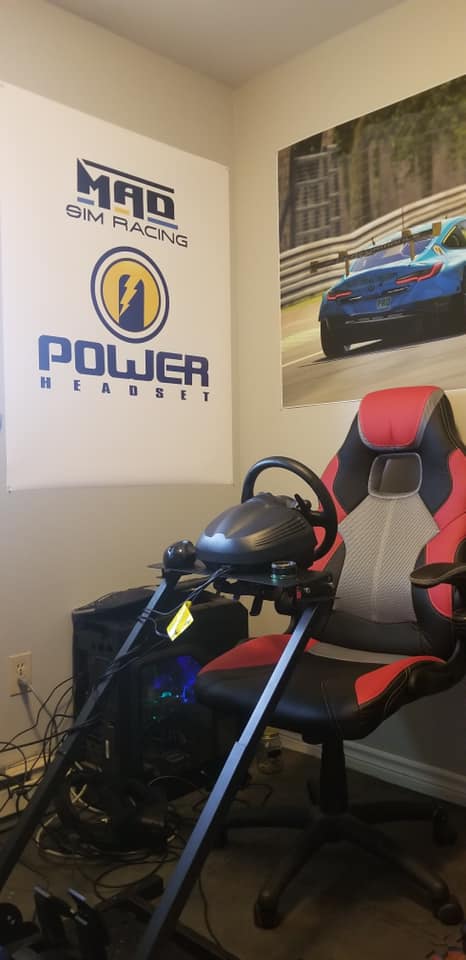MADSimRacer's tweet photo. Our team drivers representing MAD Sim Racing! Check out @RealRobGregoire repping our sponsor Power Headset and our Le Mans BMW in the #MADSimCorner and Tyler Beamon with the team decal. #iRacing #MADSimRacing https://t.co/T2KVftr2tz