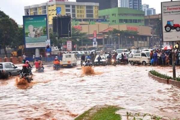 kampalawire's tweet photo. This is Kampala City after today's heavy down pour. Money paid to LDU's to torture innocent citizens should work on the drainage  #KlaWire #JusticeforTegu https://t.co/tBfR5BAGpI