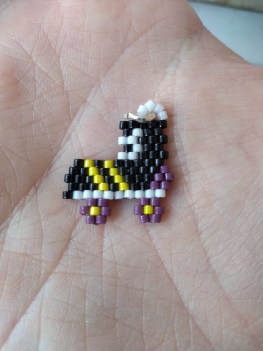 Taking commissions! (UK only), tiny roller skate pendants in pride colours of your choice, £15 plus £2.50 p&amp;p, DM me if interested! Pay me, a gay, for your pride things, instead of some rainbow capitalist! #beadwork #DerbyTwitter #RollerDerby #LGBTA #Pride