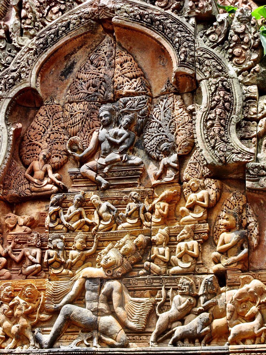 Here is another famous sculpture seen in most of the Chola temples. Ravana trying to lift mount Kailash. One can see many animals, humans, Rishis who are petrified by this act but the Lord is smiling.