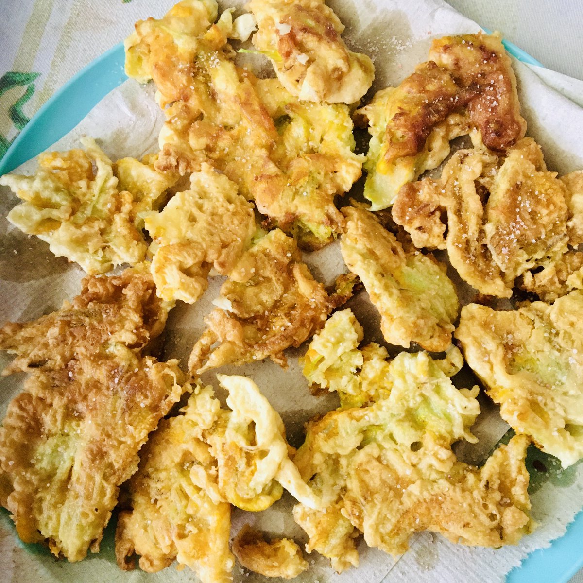 You know it's summer in Italy when you start having fried zucchini flowers! There are several ways to make your batter. The picture below is with a beer batter. I enjoy it because it's super easy and I can finish the beer as the flowers cook:) #italianatours .