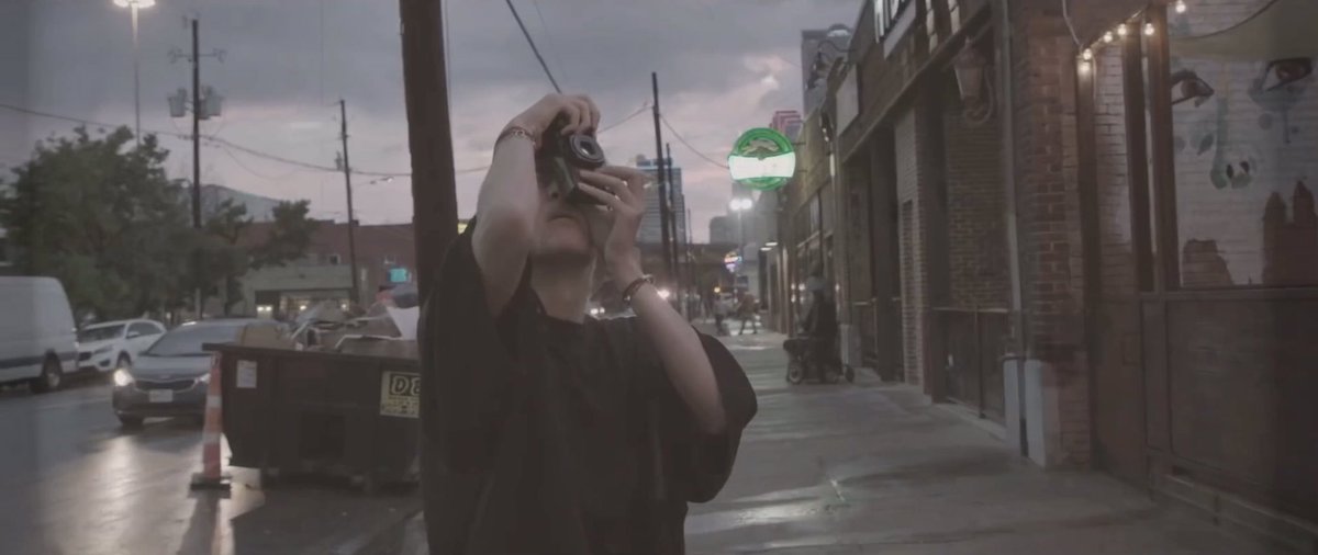 He uses the concept of traveling not only in the sense of moving from one space to another, but also w/ time. In the MV we see clips of Taehyung in his travels & takes pictures of them. The camera is a timetraveling device in the sense that it allows him revisit these moments.