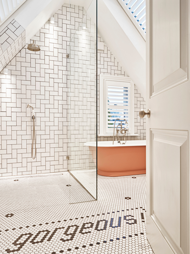 Designed by <a href="/figlondonhome/">Fig London</a> , this bathroom bursts personality with the impact of the bright colours on our Tay bath offset against the floor tiles.