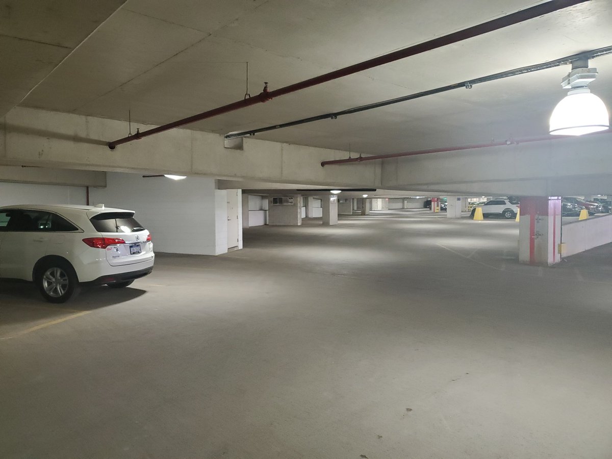 J0Nelson's tweet photo. .@UMich showing it values money over public health. Parking reinforced this month despite no students, WFM, and labs working in shifts. Grad students (who can't buy parking directly on central campus) must take shuttles or public transit while parking garages sit empty. https://t.co/YkJR6oF8B1