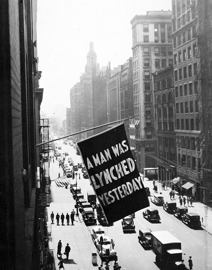 YDSABloomington's tweet photo. From 1920-1938, the @NAACP headquarters flew a “A Man Was Lynched Yesterday” flag every time a black man was lynched in the south. Today, a similar banner was seen over Walnut St. in Bloomington, IN. A man was almost lynched. #BlackLivesMatter https://t.co/6uvVlTKa0l