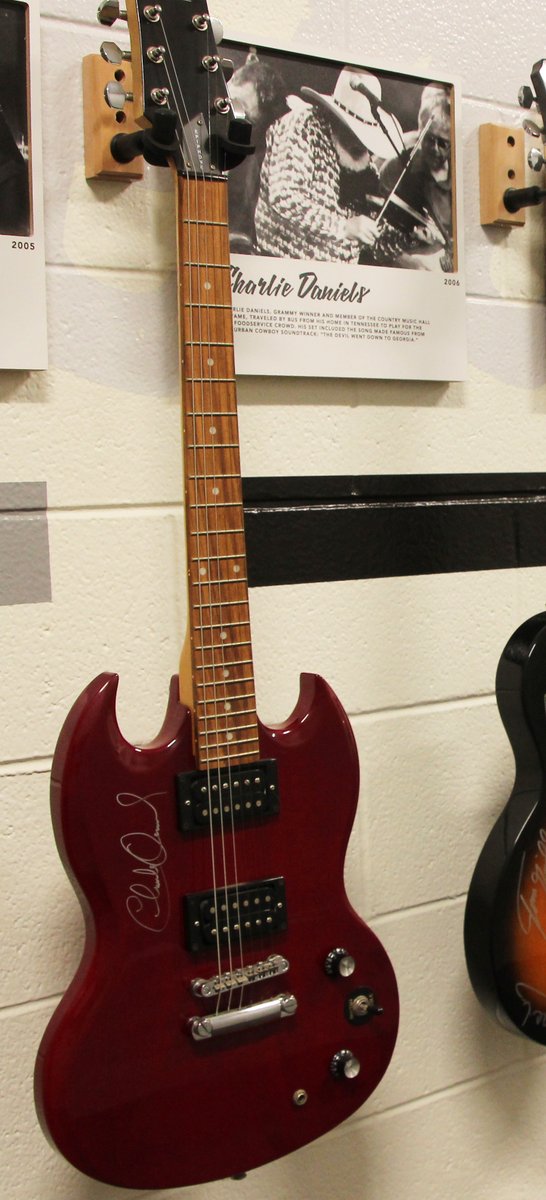 RDPFoodservice's tweet photo. @RDPFoodservice  is very sad to learn of the passing of country music legend #CharlieDaniels.  We had the pleasure of meeting and hosting Charlie at our 2006 RDP Food Show and Concert Series.  A guitar signed by Charlie hangs in our office front hallway.  Rest in peace Charlie. https://t.co/S5dDenoQhr