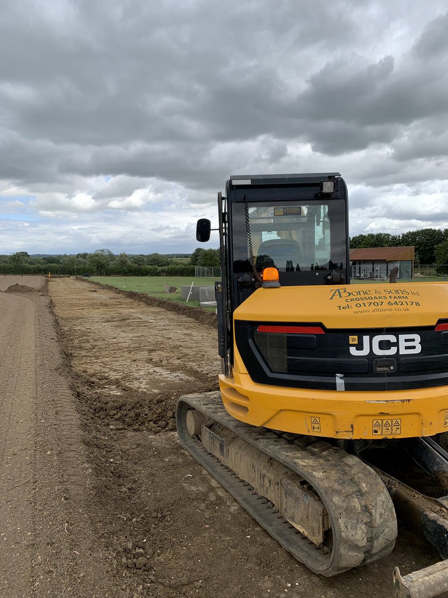 ATBone10's tweet photo. Sports and civils team cracking on really well with this cemetery extension in Milton Keynes. Roadway dug out and burial area graded ready for lateral drainage later this week #ATBgroup #thefullpackage #cemetery #construction #hardscape #landscape #essentialworks https://t.co/bsJEwN6qm6