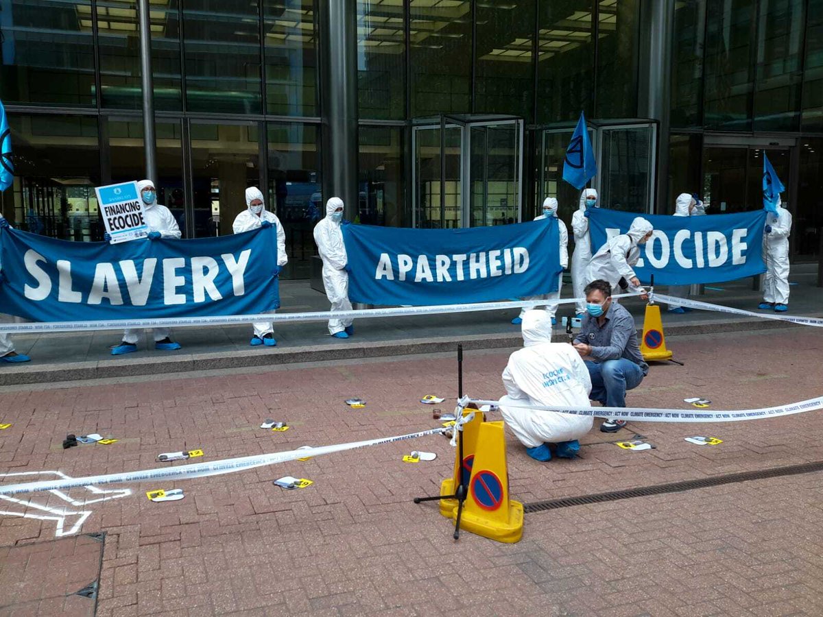 EcocideLaw's tweet photo. Spoof Sharklays  site launched with stunt at Barclays HQ today - we were there!
video: https://t.co/WpXBquGOiq
#ExtinctionRebellion 
#DAPL 
#NoDAPL https://t.co/uHBJIzNLPQ