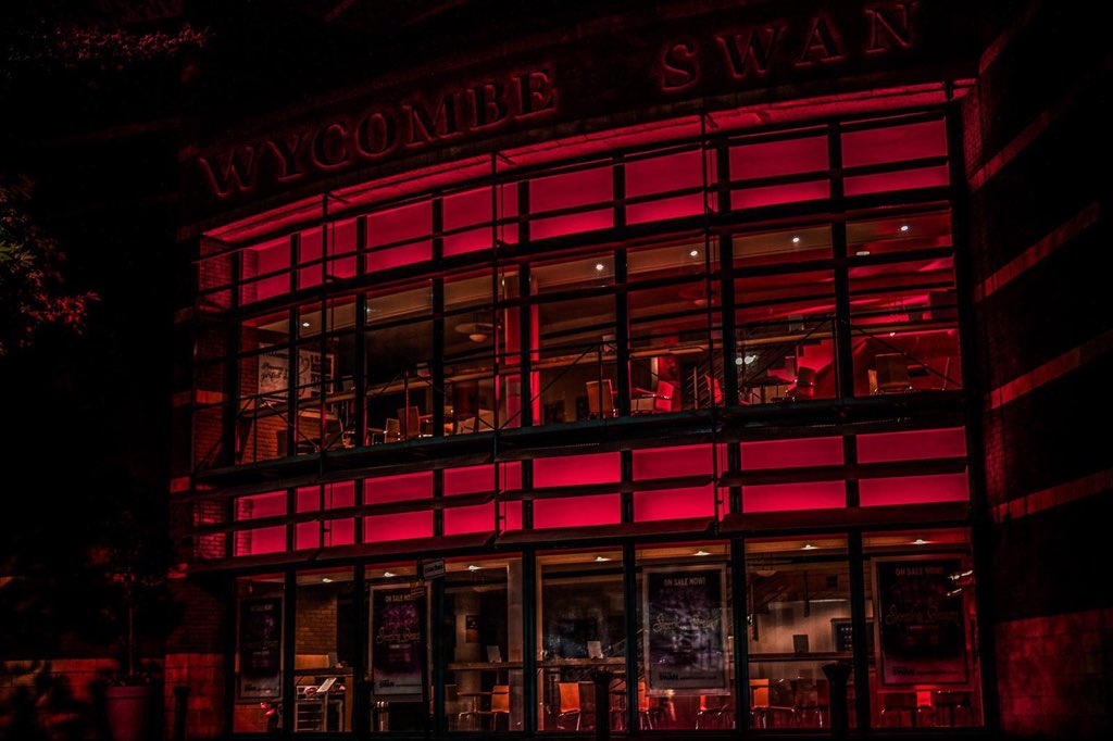 Fiona__Martin's tweet photo. As we remain on ‘standby’ - tonight the magnificent @wycombeswan will be lit red. 

We’re standing in solidarity with other venues across the UK and choosing to #lightitinred

(Thanks, @johnwebbcarter for the 📸) https://t.co/FvsA02p1ND