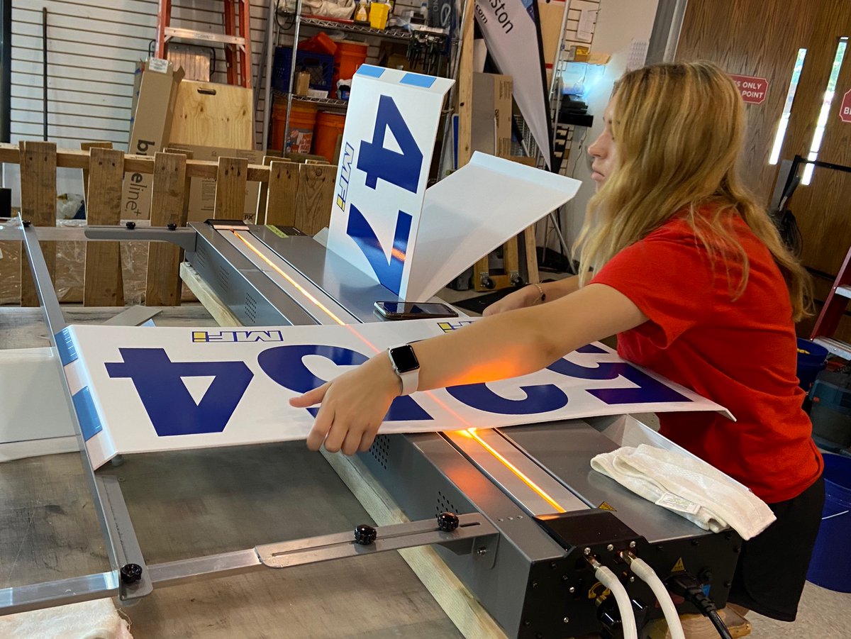 Mike_FASTSIGNS's tweet photo. We've added acrylic &amp; plastic bending to our fabrication processes. Lots of potential with this simple technology. Mallory &amp; I worked through the holiday weekend to get a 256 sign order done for a distribution center. #fastsigns https://t.co/AowTHMpfLR