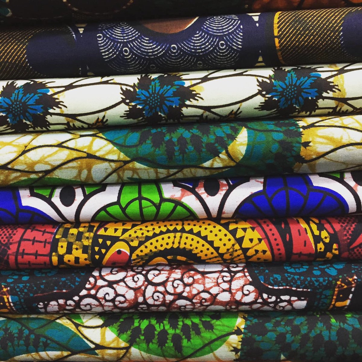 100% cotton african wax print fabric used by Molly made into beautiful skirts and our new shopping bags and produce bags. #reusable #africa #uganda #waxcloth #sustainableliving #ethicallifestyle #artisan