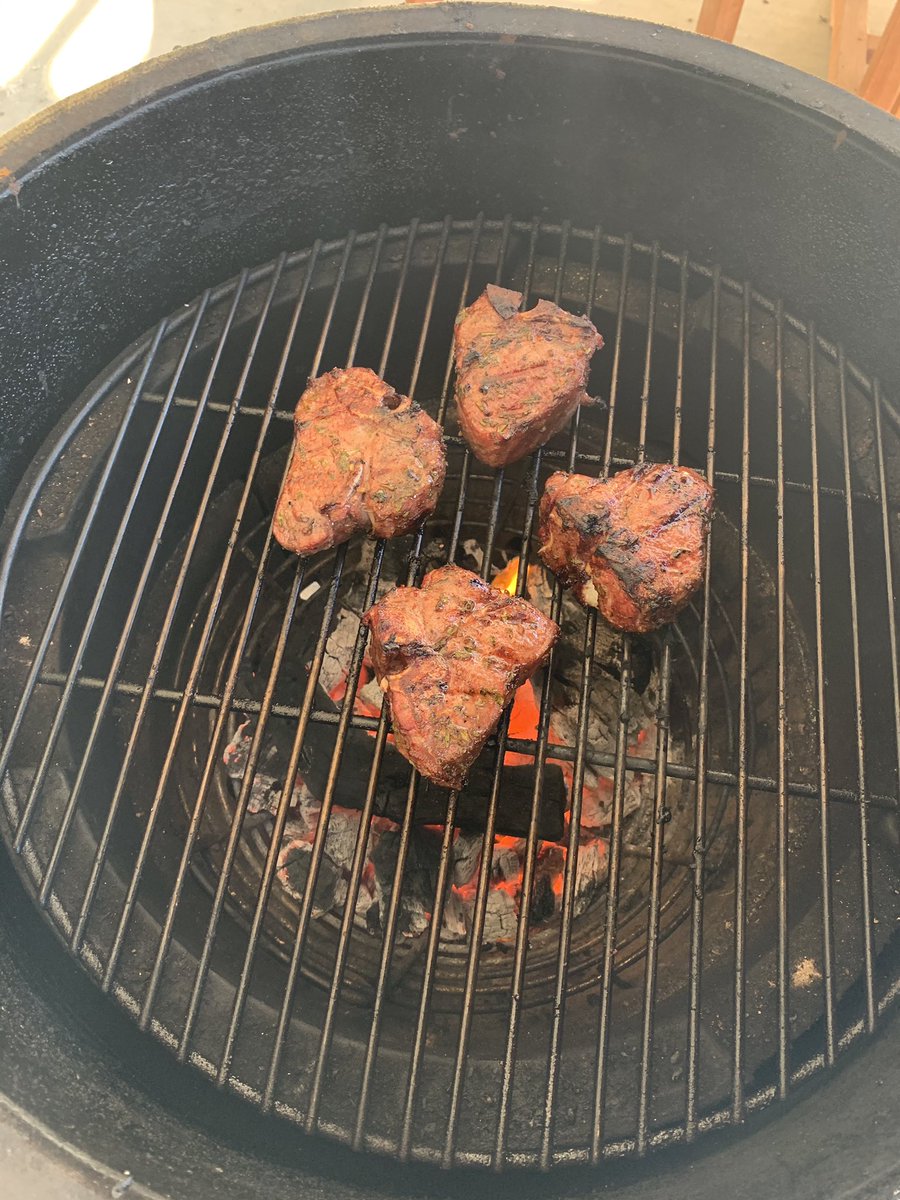 GrahamDeLaet's tweet photo. Rosemary and thyme lamb loin chops on @BigGreenEgg . Fresh veggies and edible flowers out of the garden. Finished off with our favourite Napa winery @JamesColeWinery. #NailingLife #BoiseSummers https://t.co/eVUMYYpFp5