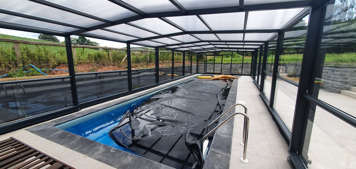 SummitLeisure's tweet photo. Beautiful installation completed this week. This high glass retractable enclosure covering a newly built pool in Ross-On-Wye. #poolenclosure #poolbuilding #indoorpool #pool #swimmingpool #retractablepoolcover #thermalpool #bespokepool #indoorswimmingpool https://t.co/JcFf1eSoxw