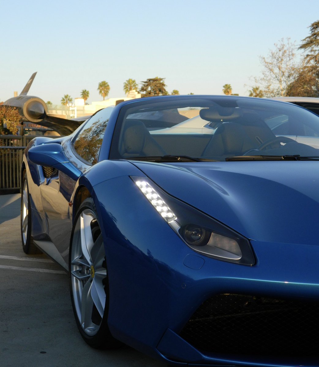 JGrunsell's tweet photo. Blu corsa Ferrari 488 spider parked in front of the Lockheed A12 Trainer at the California Science Center during my memorable road test in 2017. @FerrariConnois1 @FerrariRetweet @casciencecenter #lockheeda12 #ferrari488 @_ExoticRides_ @Petrolicious @sniffpetrol @RoadTripTV https://t.co/i7b7jkZJBc
