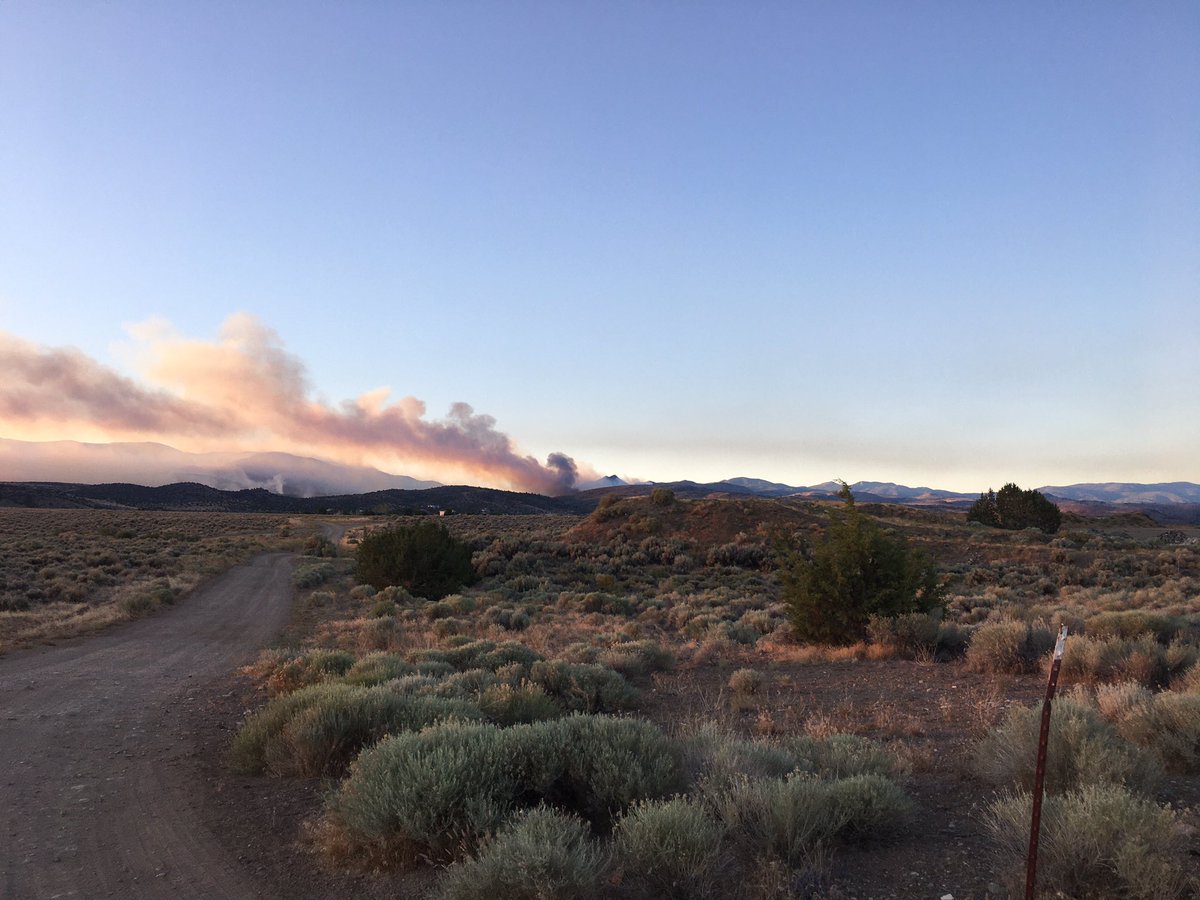 RecordCourierNV's tweet image. #numbersfire sending up a plume of smoke at sunrise.