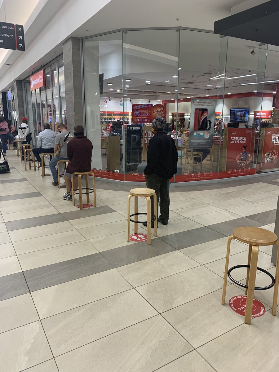 sbumkwanazi's tweet photo. How considerate of @Vodacom and @iStoreworld at @centurionmall to have chairs for patrons. #CoronaVirusSA #covid19 #smallthingsthatcount https://t.co/Vhu6c9aeR0
