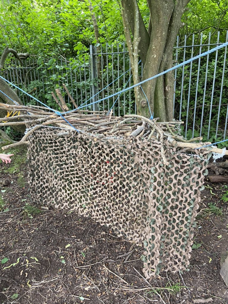 Springwood_Prm's tweet photo. Year 4 Bubble B have worked as a team creating a Den outside in the Forest Schools this afternoon. Fantastic teamwork and communication. They even measured a 2 Metre distance to create two entrances. #SpringCaernarfon https://t.co/DzpCMR7n0Y