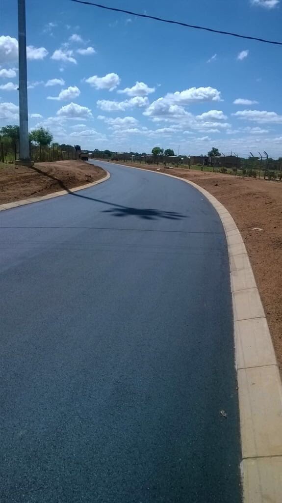 InstantTarZim's tweet photo. Rebuilding Zimbabwe one step at a time, Your community needs road rehabilitation? You need a blacktop driveway, Your organisation needs an Asphalt Driveway? We are your plug @InstantTarZim #WorldClassEngineering https://t.co/YrxGFQ18i0