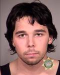 Rowan Olsen, 19, tried to barricade officers inside the courthouse at the riot. After the glass shattered, militants threw an explosive firework inside the building. In a statement, Olsen said he's peaceful. He was convicted last year of attacking police.  http://archive.vn/goHjk 