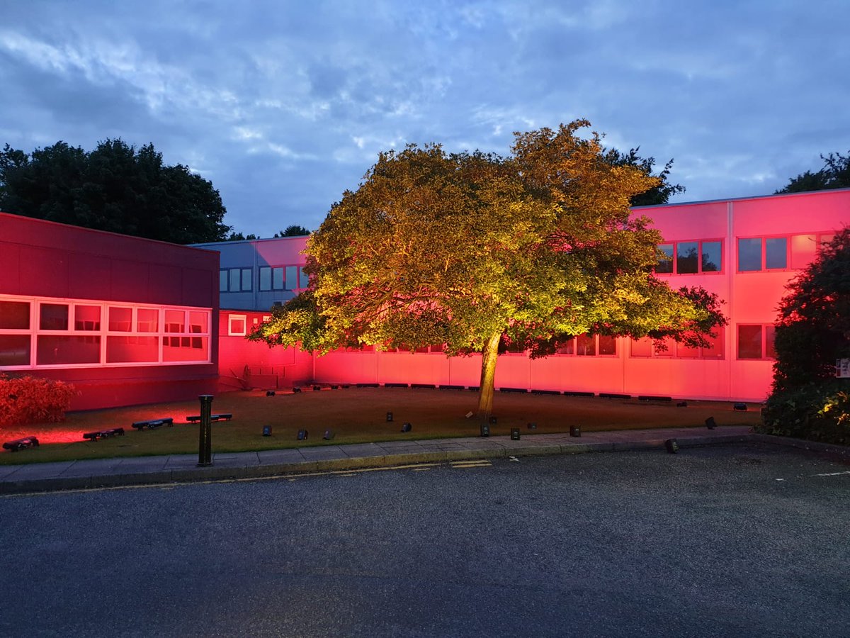 CarringtonBP's tweet photo. The business park lit up in red last night in support of the businesses in the events industry affected by Covid-19 #lightitinred #traffordcouncil @Fisherav @eventsstructure https://t.co/C0bjA7s1MW