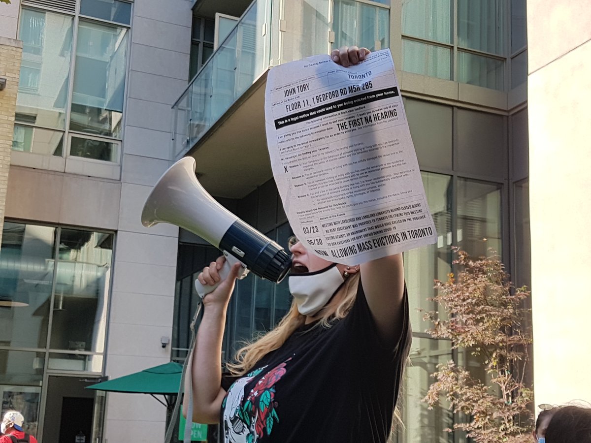 Some more photos from yesterday. Here are Bryan and Ashleigh, tenant organizers from Parkdale, speaking outside Mayor Tory's condo. Ashleigh holds up the eviction notice served to Tory by Toronto tenants. #topoli  #onpoli  #housing