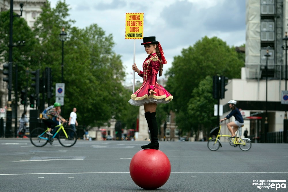 CircusCityUK's tweet photo. Brilliantly eye catching protest organised by the Association of Circus Proprietors asking No10 to either provide financial support for tented touring circuses or let them open in 2 weeks time for their essential summer season #savethecircus https://t.co/UnEsFYcURl